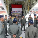 A group of TNI AU C-130J Hercules aircraft crew members
