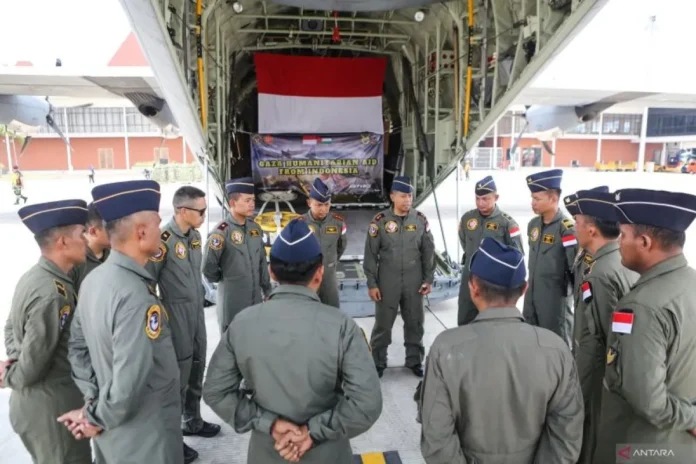 A group of TNI AU C-130J Hercules aircraft crew members