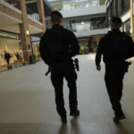 Serbian special police officers patrol at shopping mall
