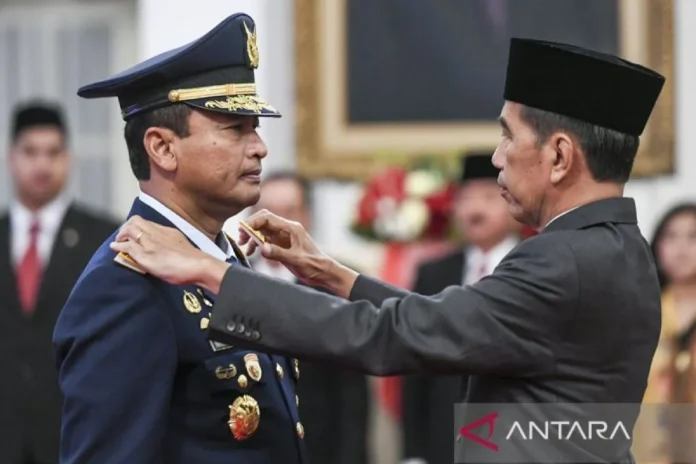 President Joko Widodo confers the rank of Air Chief Marshal TNI on Mohammad Tonny Harjono